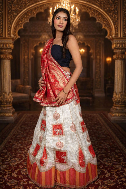 Cream & Red Shimmer Lehenga with Ganesha Embroidery and Banarasi Zari Dupatta