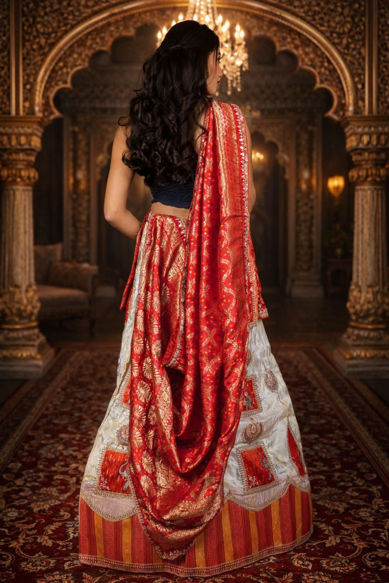Cream & Red Shimmer Lehenga with Ganesha Embroidery and Banarasi Zari Dupatta